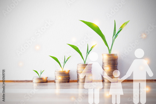 Plant on coin stack growing and Family icon over green bokeh background,investment and Save Money concept.