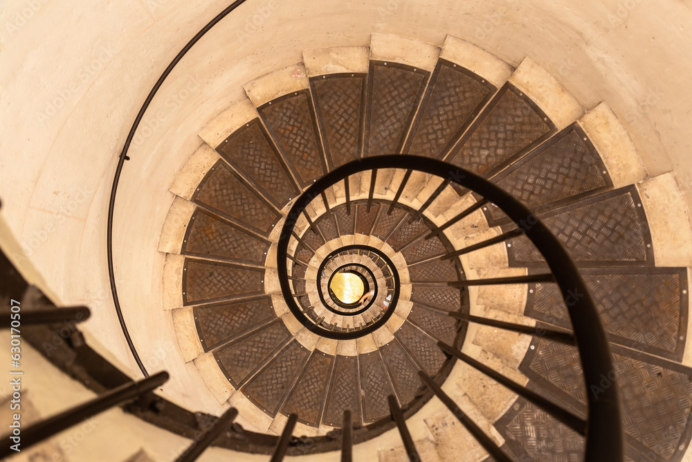 Interior and spiral staircase of Triumphal Arch (Paris Arc de Triomphe) in Paris, France Interior and spiral staircase of Triumphal Arch (Paris Arc de Triomphe) in Paris, France
