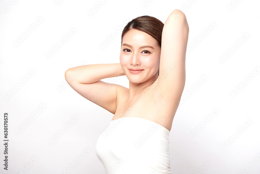 Beautiful Young Asian woman lifting hands up to show off clean and hygienic armpits or underarms on white background, Smooth armpit cleanliness and protection concept Beautiful Young Asian woman lifting hands up to show off clean and hygienic armpits or underarms on white background, Smooth armpit cleanliness and protection concept