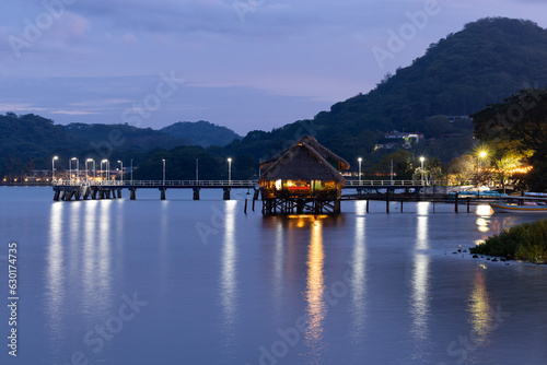 Twilight descends on the waterfront of Lake Catemaco, Veracruz, Mexico.