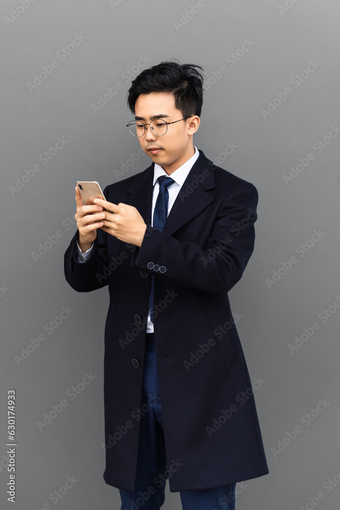 businessman is using mobile phone. businessman is using mobile phone.