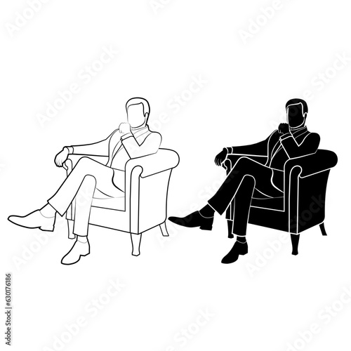 Man in a suit sitting on a chair