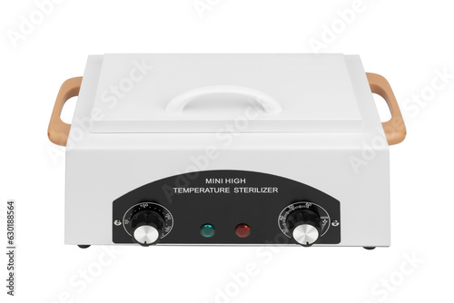 Electric sterilizer for medical devices on a white background. Mini high temperature sterilizer close-up on a white background.