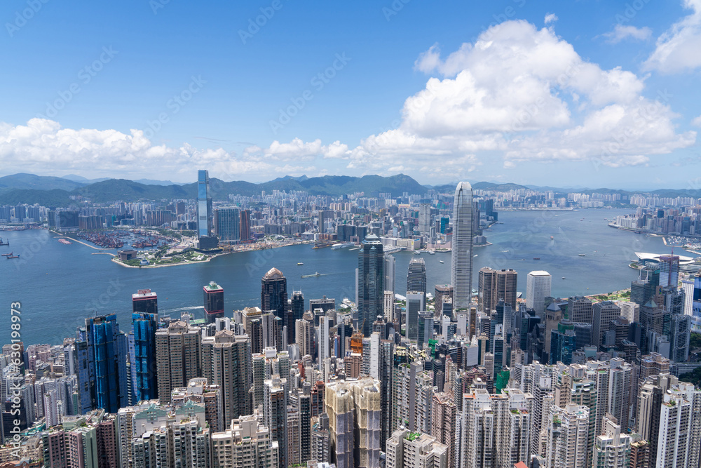 Panorama of skyline of Victoria Harbour in Hong Kong city - obrazy, fototapety, plakaty 
