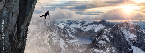 Epic Adventurous Extreme Sport Composite of Rock Climbing Man Rappelling from a Cliff.
