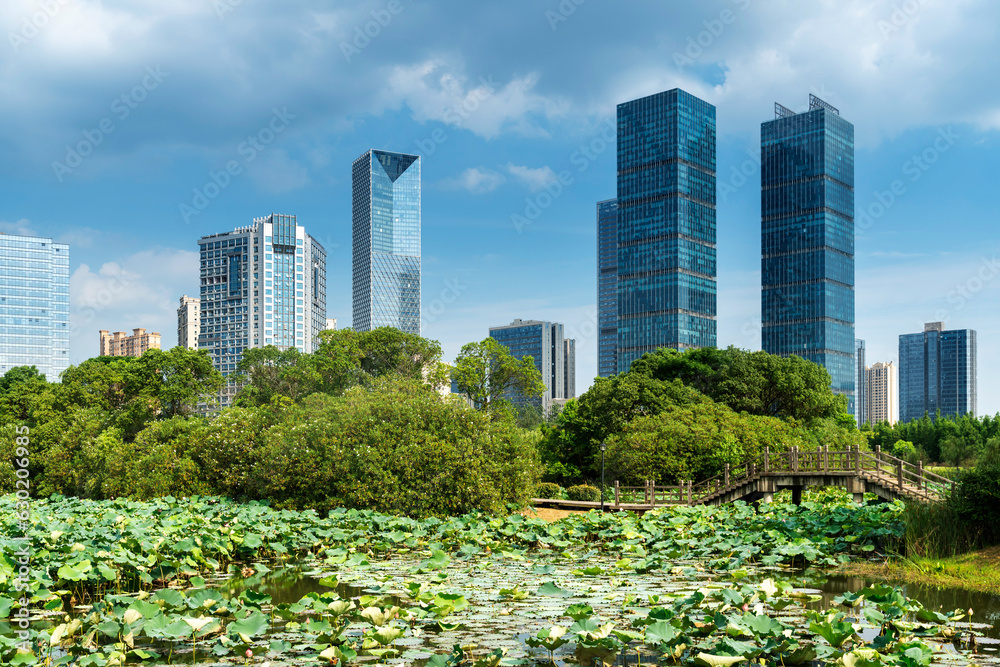 Obraz premium spring park and modern city