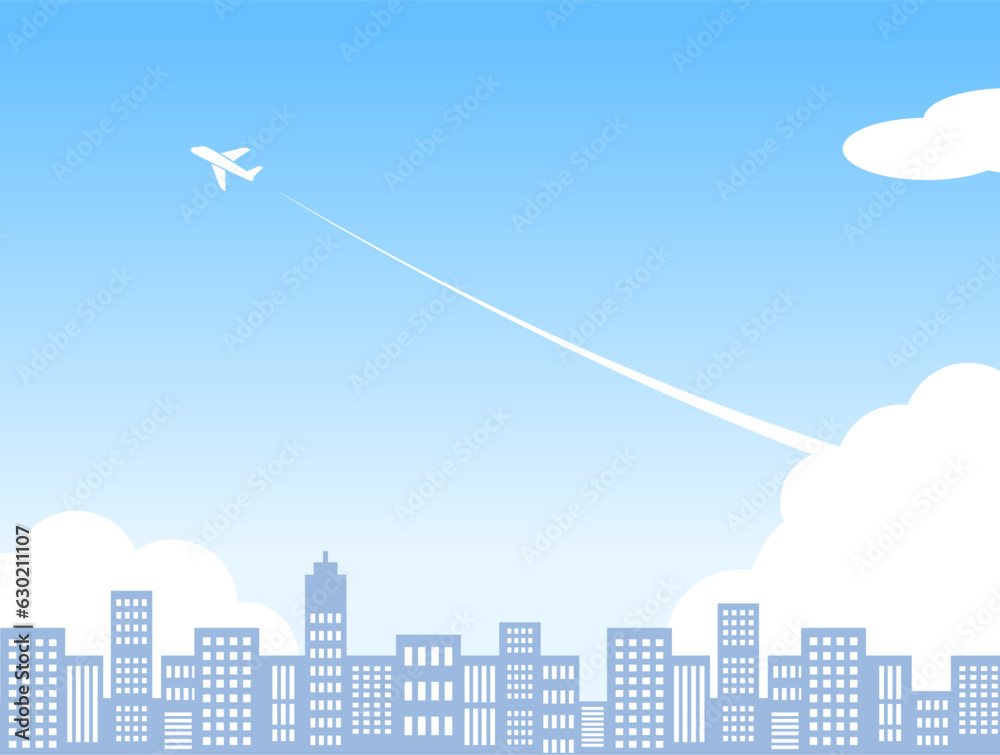 爽やかでシンプルな青空と入道雲と飛行機雲とビル街