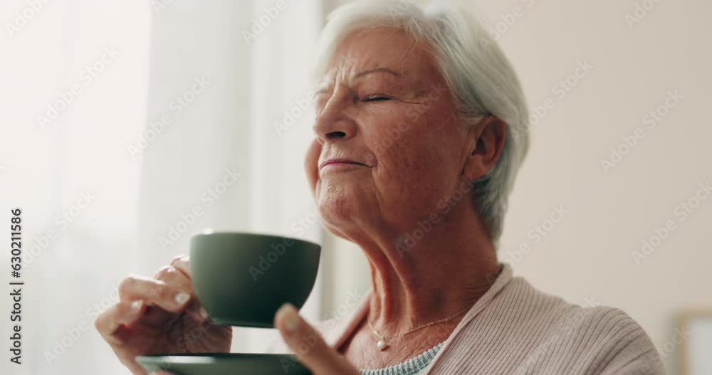 Relax, tea and a senior woman drinking from a cup in the living room of her nursing home during retirement. Face, smile or peace and an elderly female pensioner feeling carefree with a beverage Relax, tea and a senior woman drinking from a cup in the living room of her nursing home during retirement. Face, smile or peace and an elderly female pensioner feeling carefree with a beverage