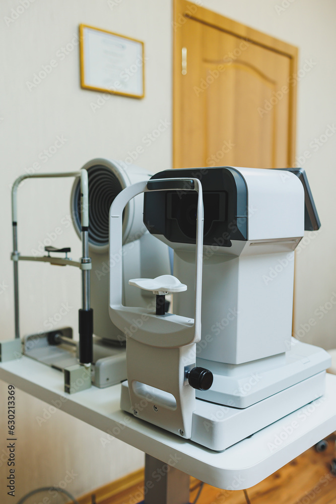 Modern apparatus for checking vision during ophthalmic treatment. Modern office of an ophthalmologist. Modern apparatus for checking vision during ophthalmic treatment. Modern office of an ophthalmologist.