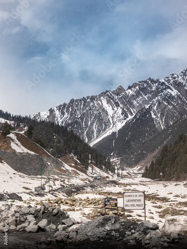 Beautiful winter landscape with snow covered trees and mountains in Kashmir.