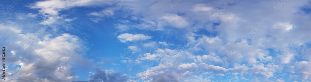 Obraz premium White cumulus clouds on blue sky, nature background