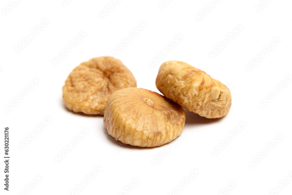 Dried fig fruits isolated on white. Three sweet sundried figs Dried fig fruits isolated on white. Three sweet sundried figs