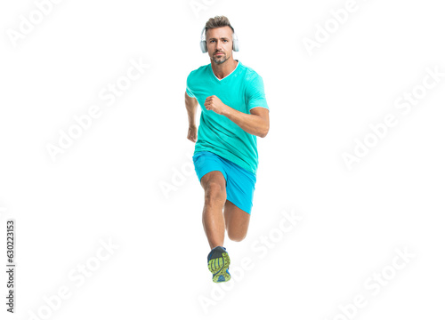 confident sport jogger listen to music in headphones. The jogger ran at sport training isolated on white. In a morning sport workout jogger run in studio. The jogger stretched legs before running