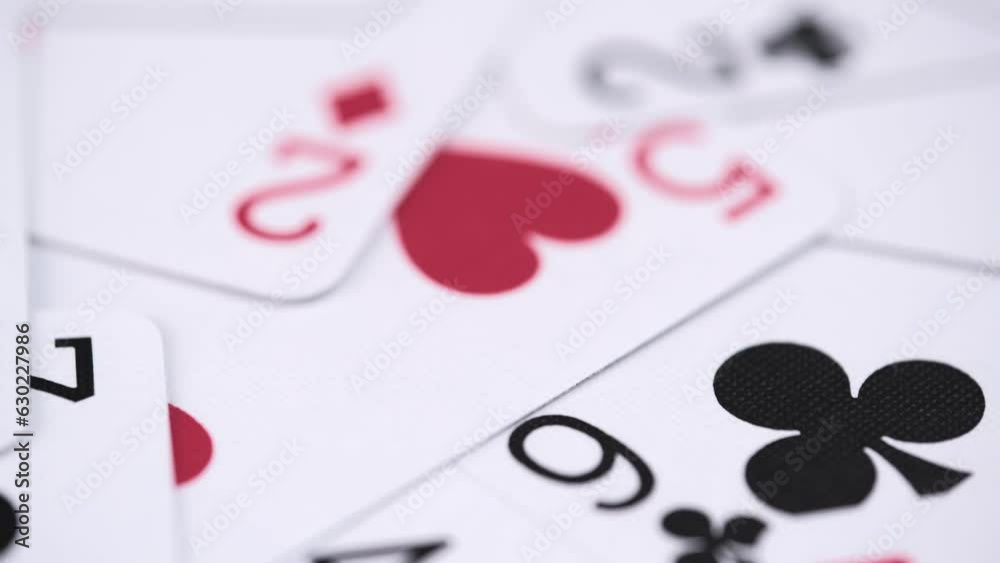 closeup rotation of playing cards. soft focus. poker cards rotating pattern macro texture background. closeup rotation of playing cards. soft focus. poker cards rotating pattern macro texture background.