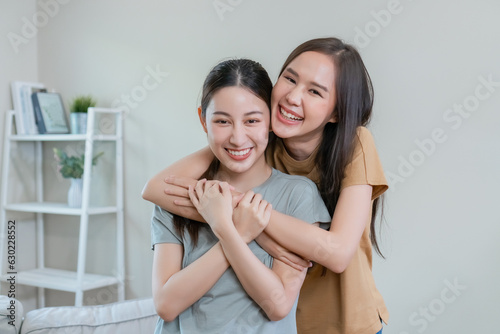 Happy asian girl couple cheerful. Homosexual couple hugging each other in love. LGBT Lesbian couple love. cheerful girlfriends romance.