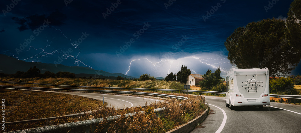 White Caravan Motorhome Car Goes On Highway Road. bad weather, dangerous, thunderstorm, flash, lightning, thunderlight