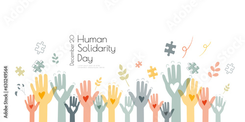 Human Solidarity Day banner. Raised hands concept.