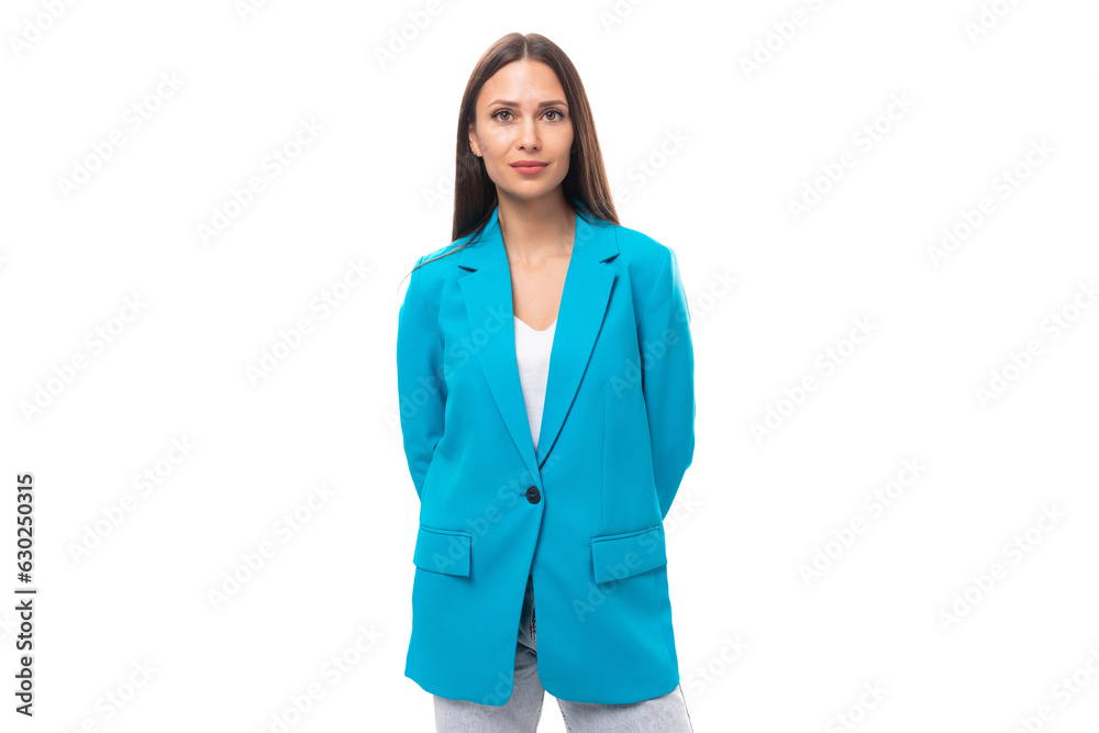 young successful office worker woman with black straight hair in a blue business jacket on a white background with copy space young successful office worker woman with black straight hair in a blue business jacket on a white background with copy space