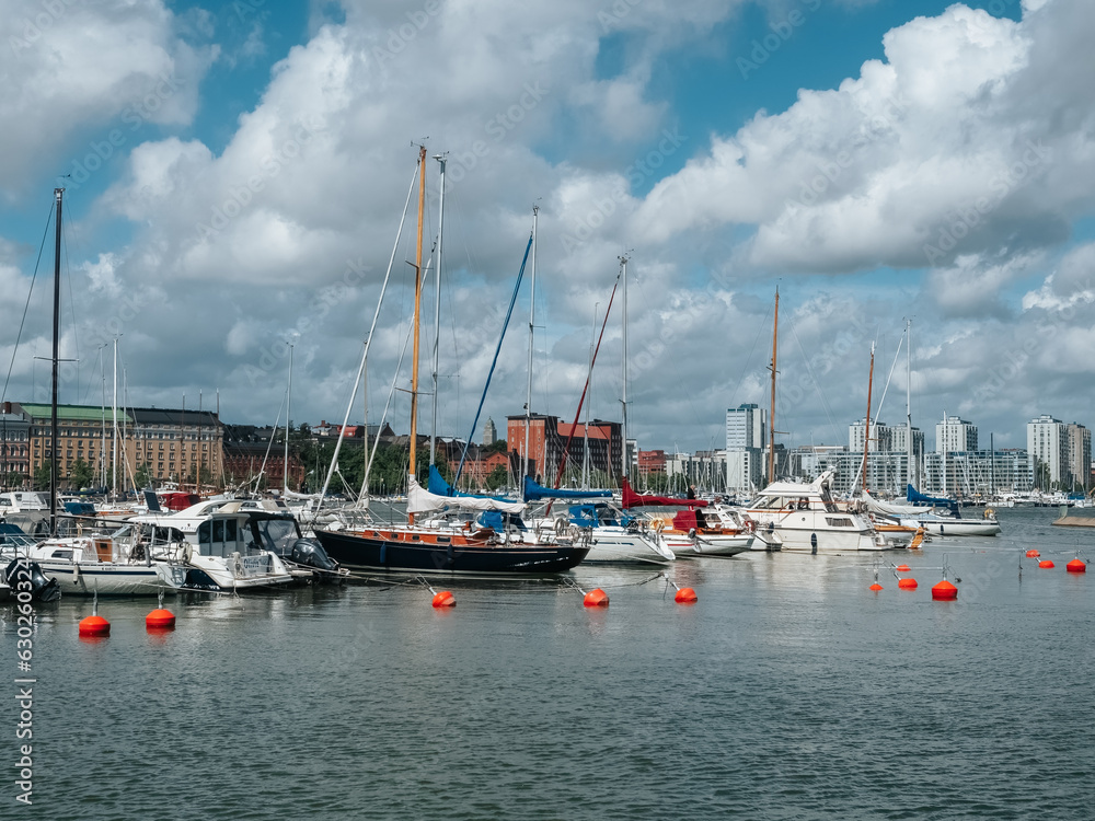 Helsinki, Finland - 07 04 2023: Boats on the waterfront in Helsinki. City marina