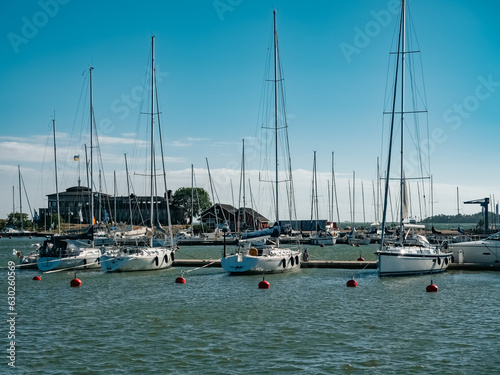 Helsinki, Finland - 07 04 2023: Boats on the waterfront in Helsinki. City marina photo