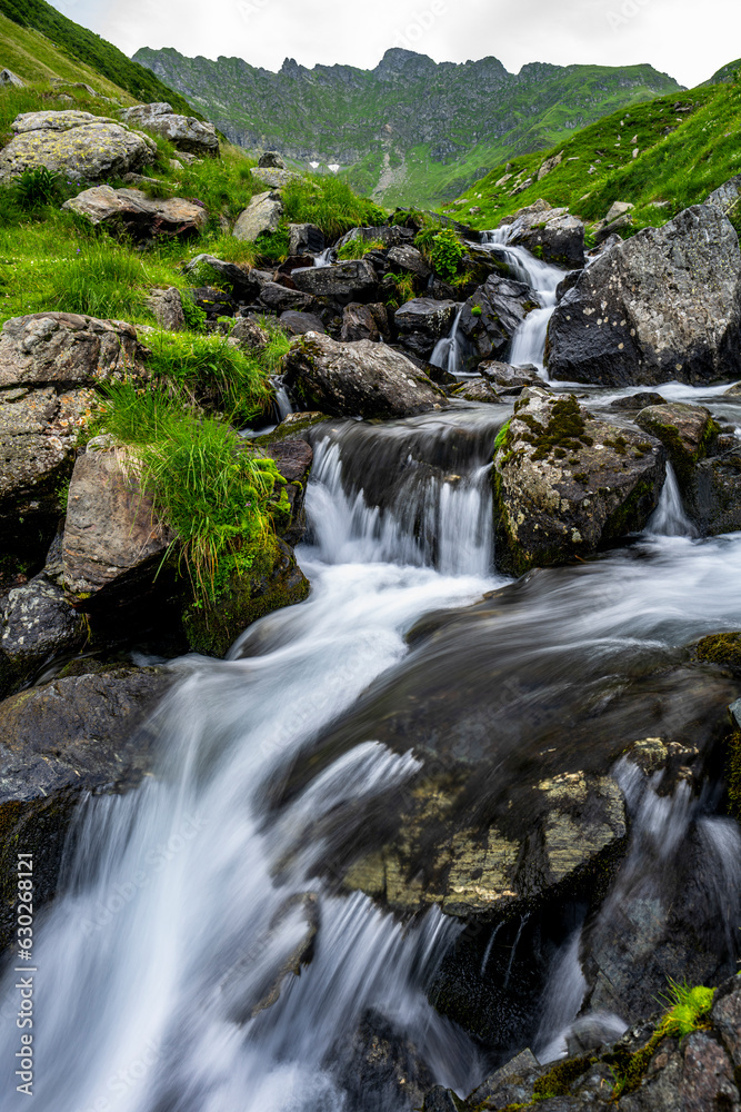 Summer landscape of the Fagaras Mountains, Romania. A view from the hiking trail near the Balea Lake and the Transfagarasan Road.