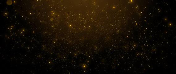 Gold particles abstract background with shining golden particle stars dust. Beautiful futuristic glittering in space on black background.
