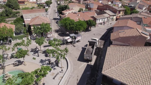 Aerial: roadwork in Navas del Rey, Spain - construction fixing village roads photo