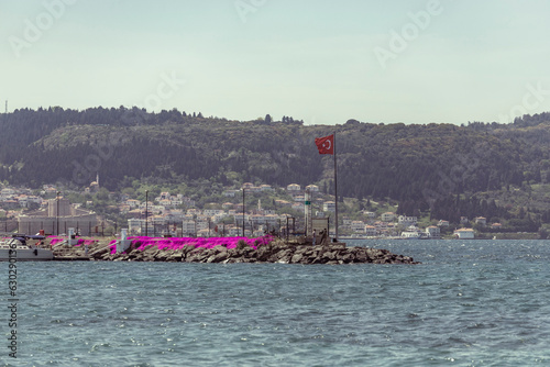 View of Canakkale coastline near the harbour, a small town along the Dardanelles Strait, Sea of Marmara, Turkey. photo