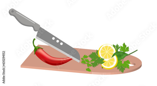 A wooden cutting board and a knife that cuts chili pepper, parsley and lemon. The concept of cooking, healthy food, salad.