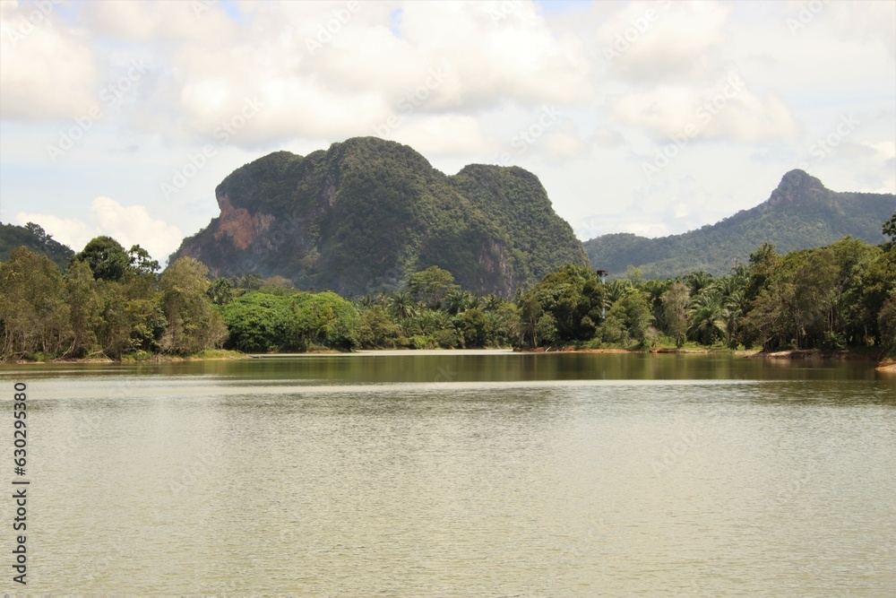 lake in Thailand with mountains in the background 
