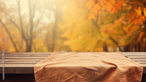 Fototapeta Naklejka Na Ścianę i Meble -  Beautiful fall autumn sunset forest woodland natural mockup wooden table cloth empty blank plank product free space display montage copy space banner.