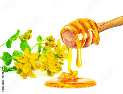 dripping honey and St. John's wort isolated on white background