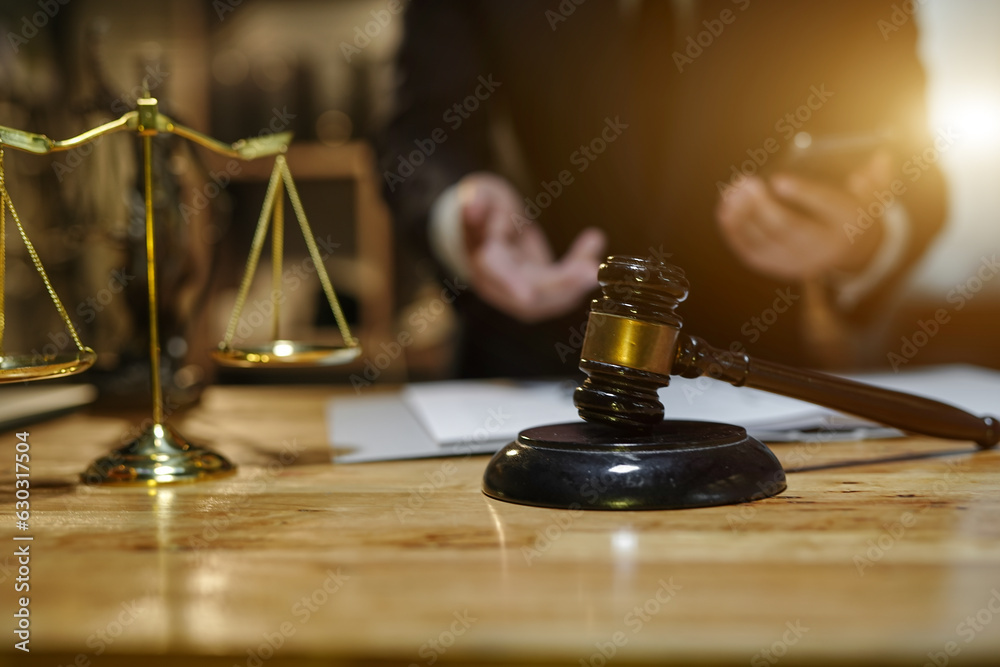 Male lawyer businessman sitting in the office doing legal work. Male lawyer businessman sitting in the office doing legal work.