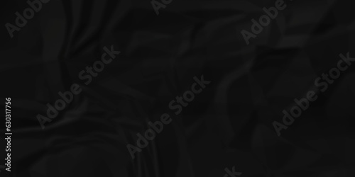 Dark crumple black paper wrinkled poster template ,blank glued creased paper texture background. black paper crumled backdrop background. used for cardboard and clarkboard.