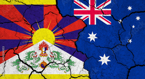 Flags of Tibet and Australia on cracked surface - politics, relationship concept