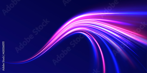 Neon color glowing lines background, high-speed light trails effect. Abstract neon background with shining wires. Motion design. Magic empty space. 