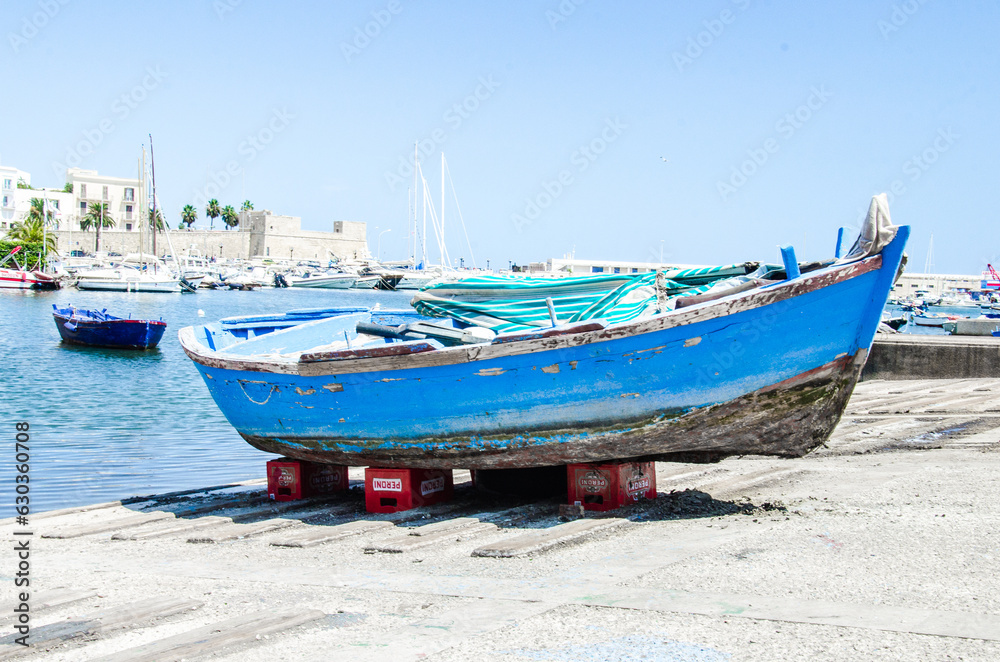 Blue boat on the beach of Bari, Italy Blue boat on the beach of Bari, Italy