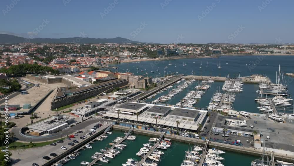 Aerial view of the Cascais Marina during summer in Cascais, Lisbon District, Portugal. The Cascais Marina is the largest marina on the Portuguese Riviera and the third largest in the country. Aerial view of the Cascais Marina during summer in Cascais, Lisbon District, Portugal. The Cascais Marina is the largest marina on the Portuguese Riviera and the third largest in the country.