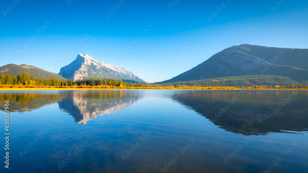 Vermilion lakes. Landscape during daylight hours. A lake in a river valley. Fall view. Mountains and forest. Natural landscape. Banff National Park, Alberta, Canada.