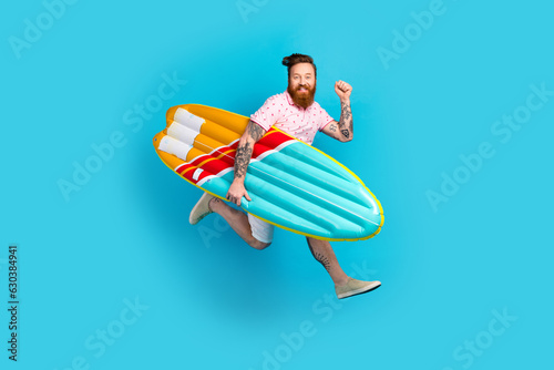 Canvas Print Full length profile portrait of carefree attractive guy jump run hold inflatable