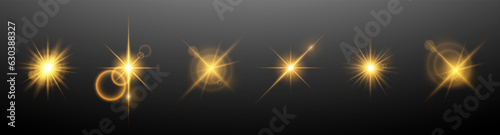 Shining golden light effects on a dark background. A collection of various glowing sparks, stars. The effect of glow, radiance, shine. Vector illustration.