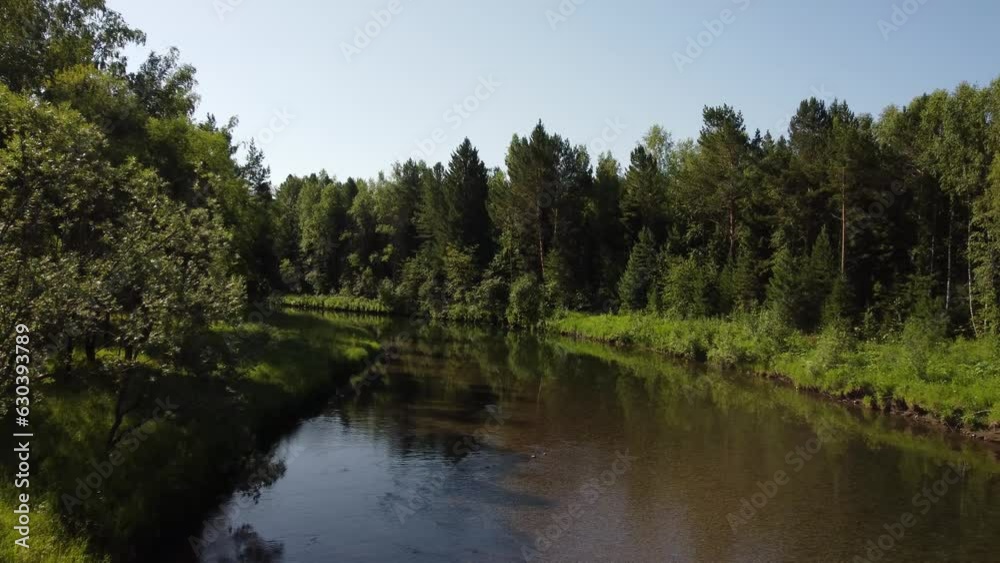 Aerial view of a river streaming through forest. Top view from drone, camera move toward. Forest, hills and river landscape Aerial view of a river streaming through forest. Top view from drone, camera move toward. Forest, hills and river landscape