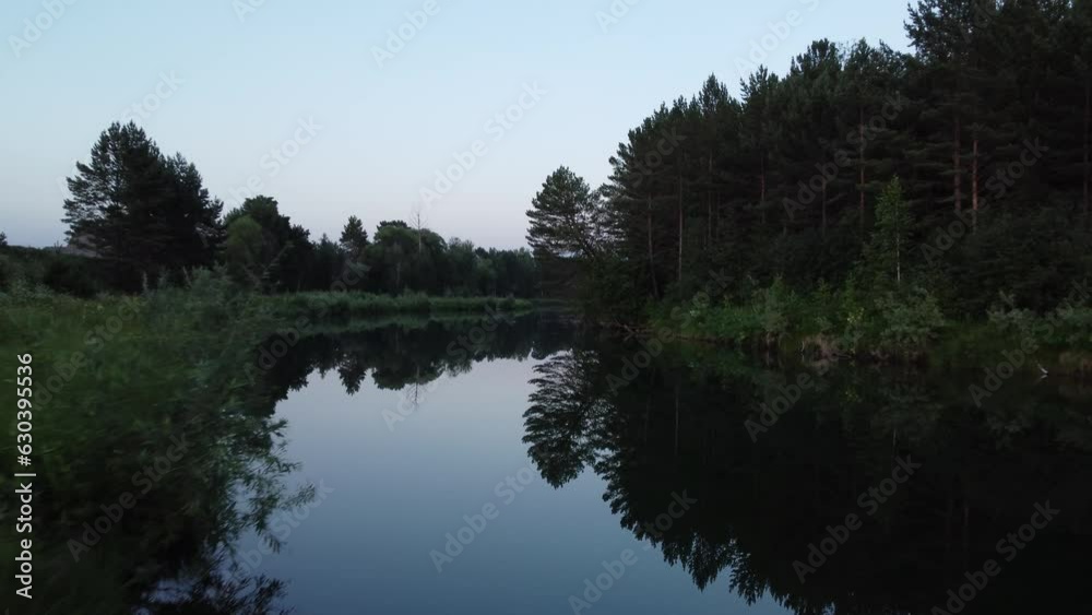Aerial view of a river streaming through forest. Top view from drone, camera move toward. Forest, hills and river landscape Aerial view of a river streaming through forest. Top view from drone, camera move toward. Forest, hills and river landscape