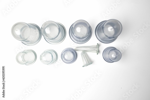 Collection of cups for cupping massage on the white background