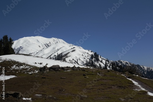 Winter landscape featuring a snowy hill: Makra Peak, Siri Paay Pakistan photo