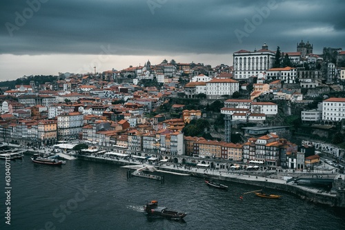 Aerial view of the bustling cityscape of Porto  Portugal in the evening