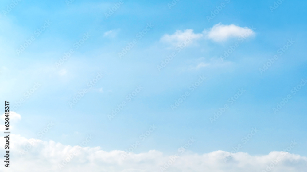 Blue sky with white fluffy cloud. Cumulus clouds background. Cloudscape morning sky. The concepts of freedom of live, never give up and positive though energy. Blue sky with white fluffy cloud. Cumulus clouds background. Cloudscape morning sky. The concepts of freedom of live, never give up and positive though energy.