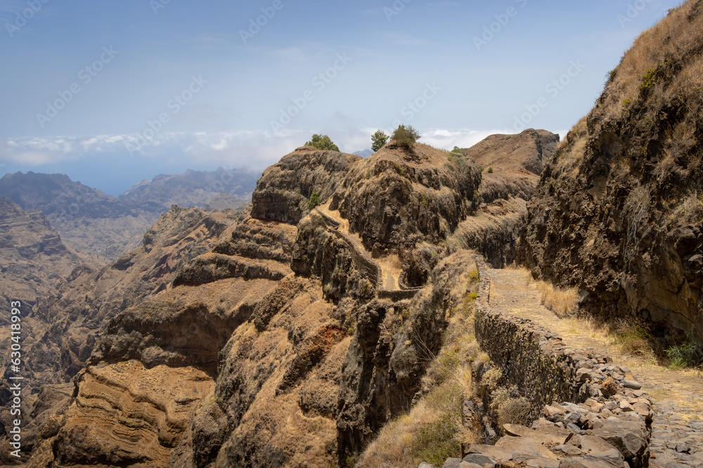 stunning hiking path on mountain rim on Santo Antão in Cape Verde stunning hiking path on mountain rim on Santo Antão in Cape Verde