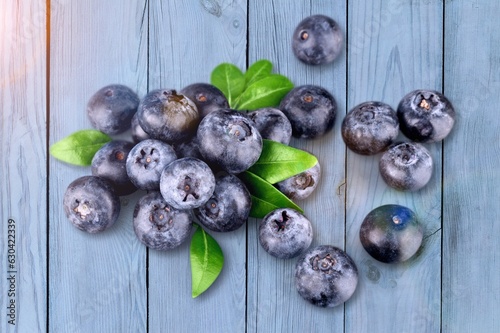 Fresh ripe blueberry with green  leaves