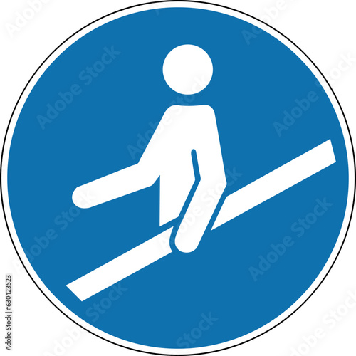 Railing sign. Mandatory sign. Round blue sign. Use railings for safety. Caution, stairs, escalators and moving walkways. Follow the safety rules.